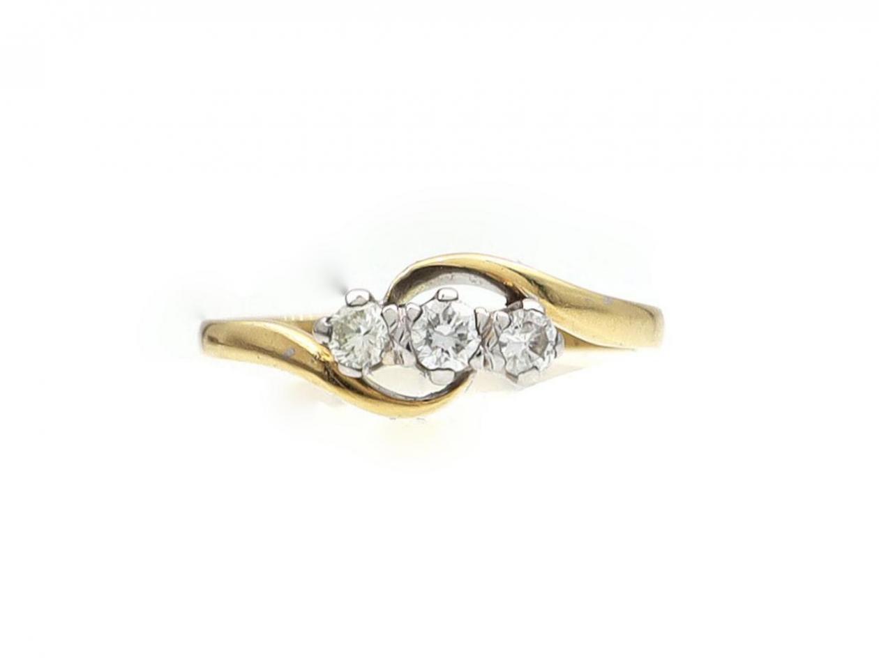 Vintage three stone diamond twist ring in 18kt gold
