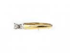 18kt yellow gold flanked diamond solitaire engagement ring