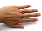 Antique emerald and diamond three stone carved ring