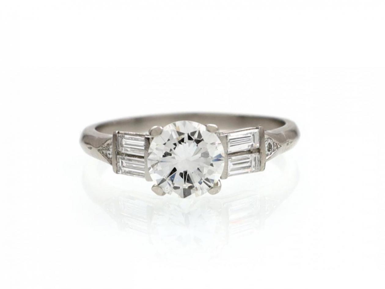 Vintage diamond solitaire engagement ring in platinum