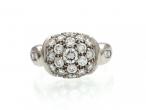 Platinum diamond set bombé cluster ring