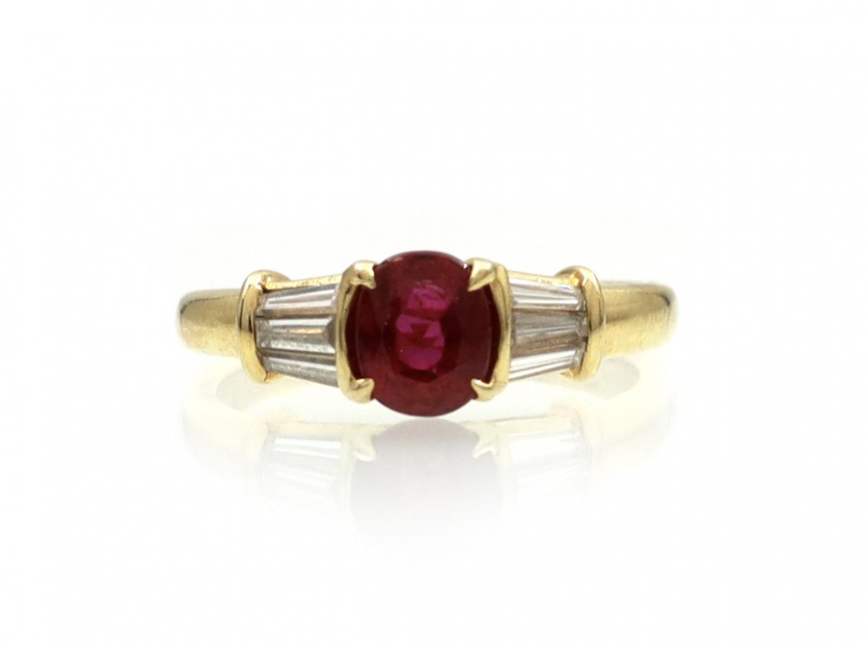 Vintage ruby and diamond solitaire ring in 18kt gold