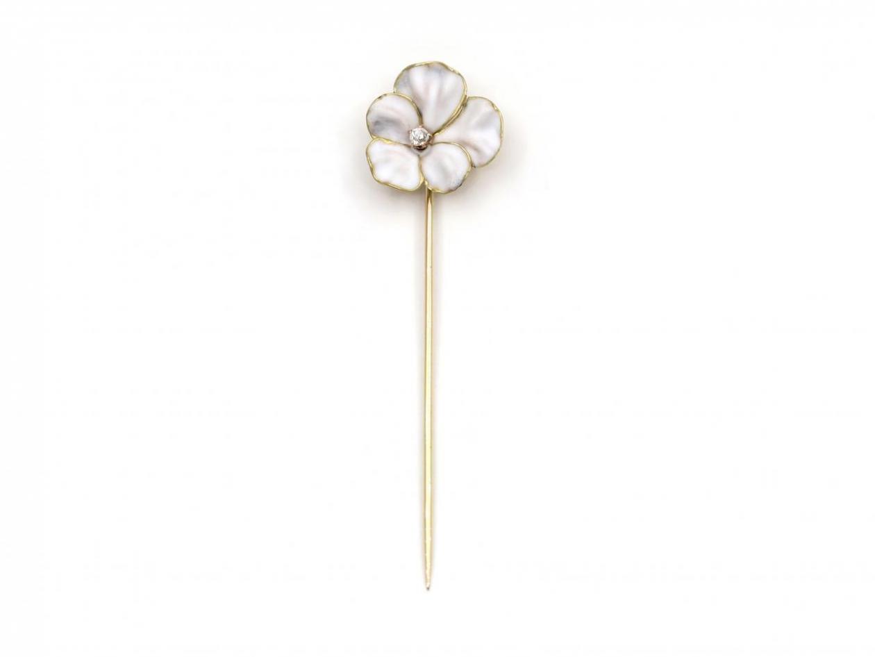 White enamel and diamond flower stick pin