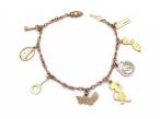 Vintage charm bracelet with eight charms in 9kt yellow gold