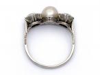 Edwardian natural pearl and diamond three stone ring