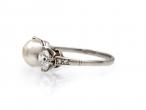 Edwardian natural pearl and diamond three stone ring