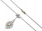 1920s platinum diamond openwork pendant with length adjuster