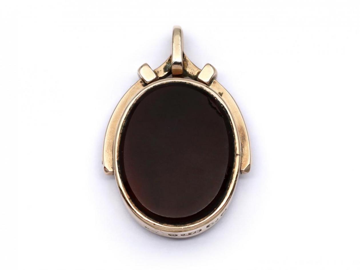 Oval carnelian and bloodstone spinning fob in yellow gold