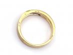 Baguette cut diamond crossover wedding ring in 18kt gold