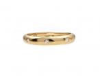 Contemporary three stone diamond wedding ring in gold
