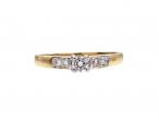 Diamond solitaire engagement ring in 18kt yellow gold