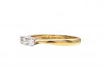 Three stone diamond engagement ring in 18kt yellow gold