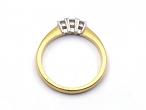 Three stone diamond engagement ring in 18kt yellow gold