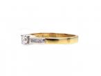 Contemporary diamond solitaire engagement ring in 18kt yellow gold