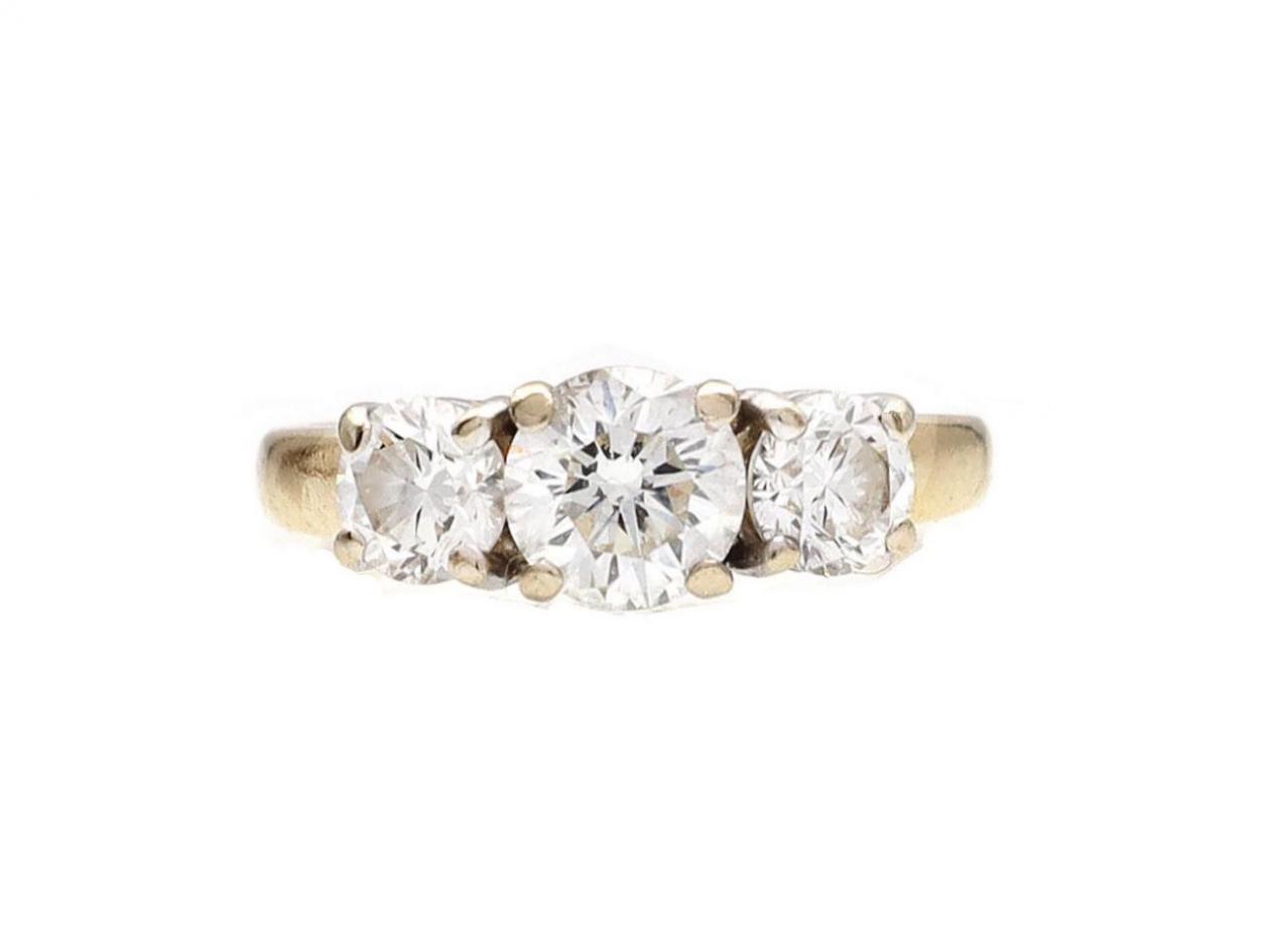 Vintage graduating three stone diamond engagement ring