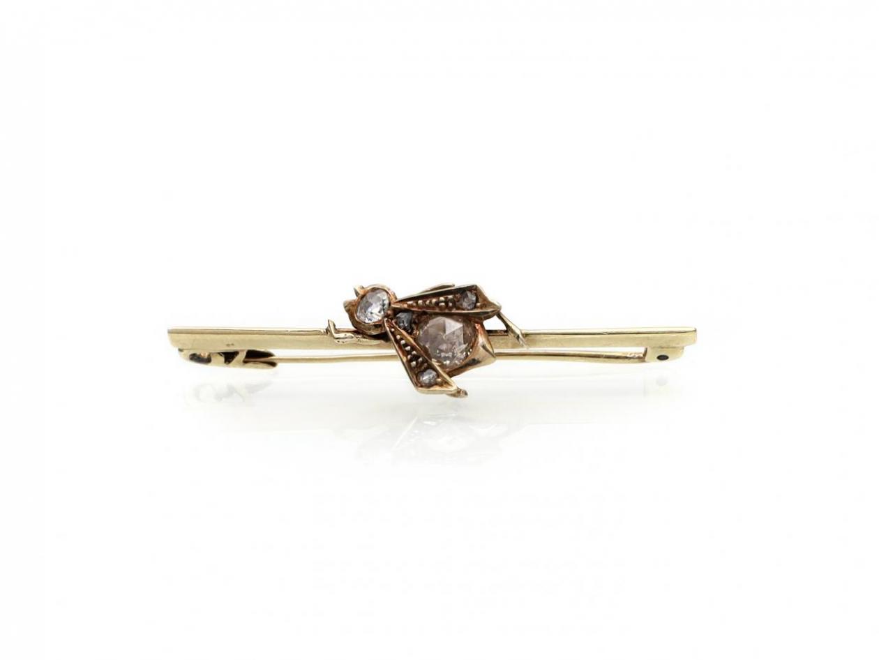 Antique diamond set fly bar brooch in 18kt yellow gold