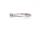 Contemporary diamond solitaire engagement ring in 18kt white gold