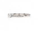 Flanked solitaire diamond engagement ring in 18kt white gold