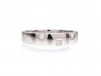 18kt white square wedding ring set with princess cut diamonds