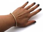 Vintage 18kt yellow gold frosted spring hinged bangle