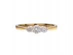 Contemporary graduating diamond three stone ring in 18kt yellow gold