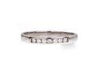 Seven stone diamond channel set ring in 18kt white gold