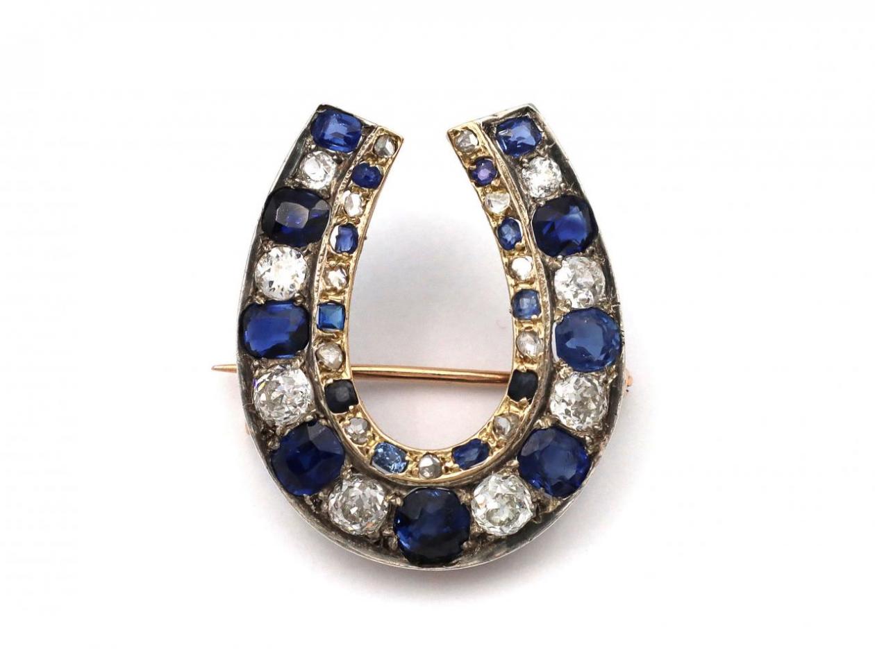 Antique French sapphire and diamond horseshoe brooch