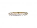 Diamond rubover set half eternity ring in 9kt yellow gold