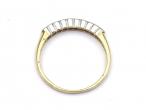 Diamond rubover set half eternity ring in 9kt yellow gold
