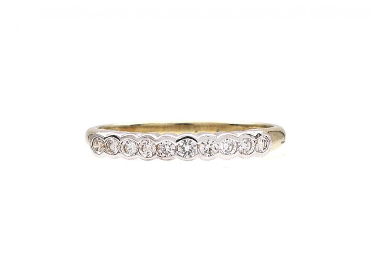 Diamond rubover set half eternity ring in 9kt yellow gold