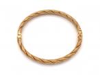 Retro textured twisted rope spring bangle in 9kt yellow gold
