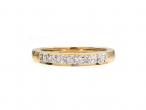 Diamond illusion set half eternity ring in 18kt yellow gold