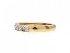 Diamond illusion set half eternity ring in 18kt yellow gold
