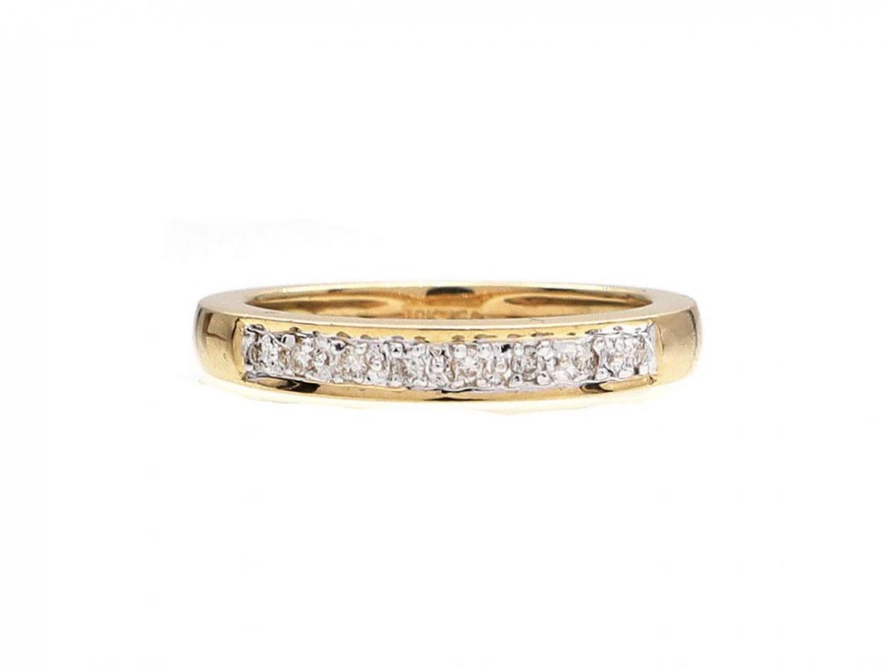 Diamond illusion set half eternity ring in 18kt yellow gold