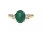 Contemporary emerald and diamond three stone ring in 18kt gold