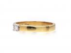 Diamond solitaire engagement ring in 18kt yellow gold