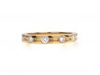 Five stone diamond wedding ring in 18kt yellow gold