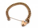 Antique 9kt yellow gold close curb bracelet with heart lock