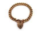 Antique 9kt yellow gold close curb bracelet with heart lock