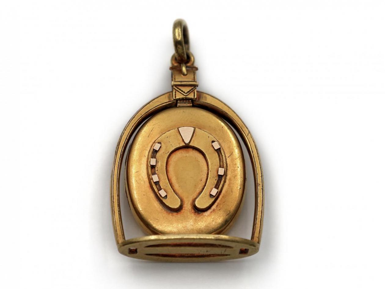 Victorian horse stirrup and horseshoe oval locket in gold
