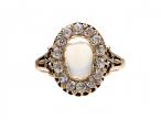 Victorian oval moonstone and diamond cluster ring in 18kt gold