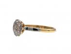 Edwardian diamond cluster ring in platinum and yellow gold