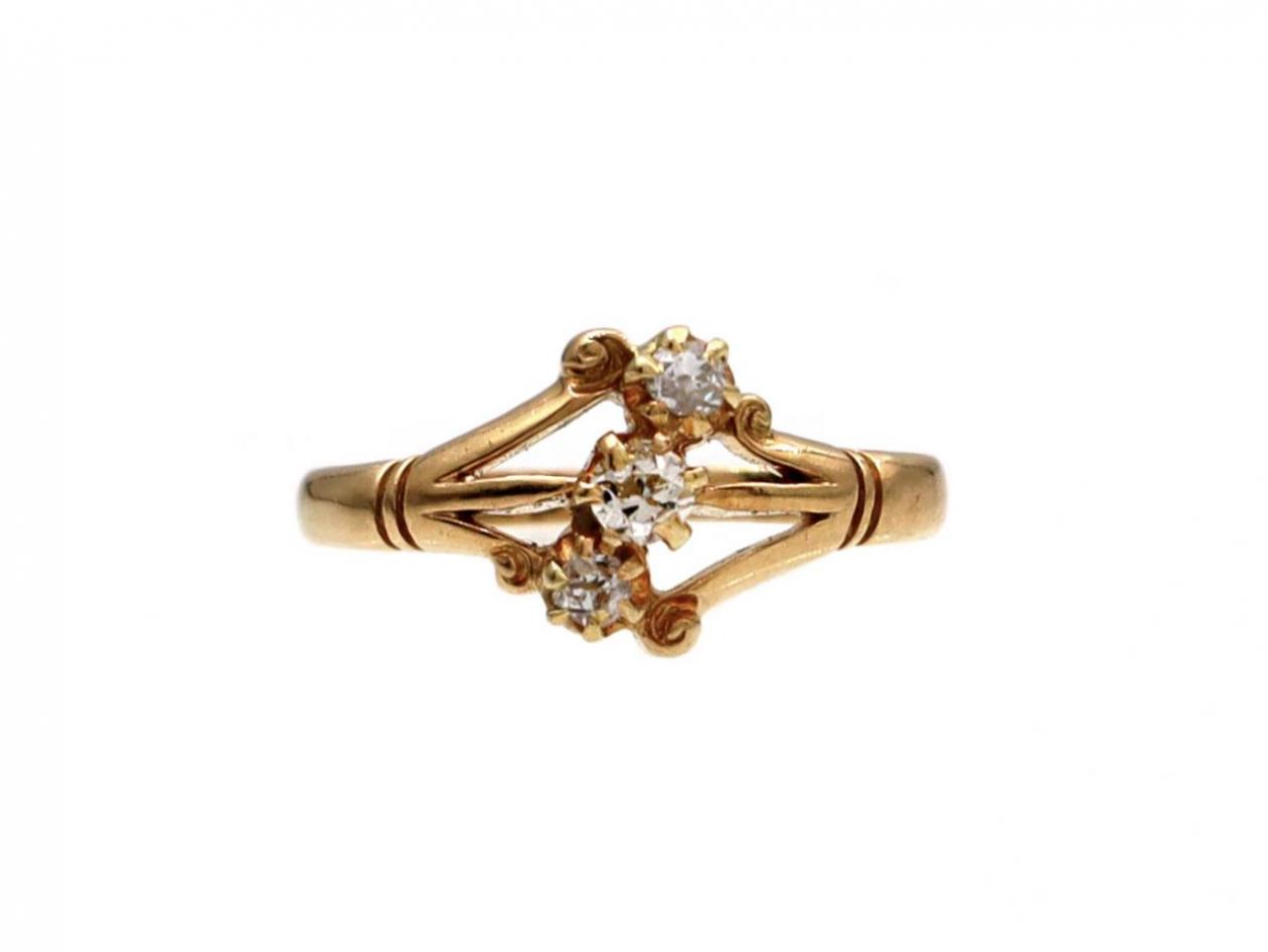 Antique diamond diagonal three stone ring in 18kt yellow gold