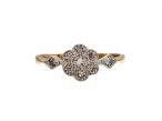 Antique diamond daisy cluster ring in 18kt gold