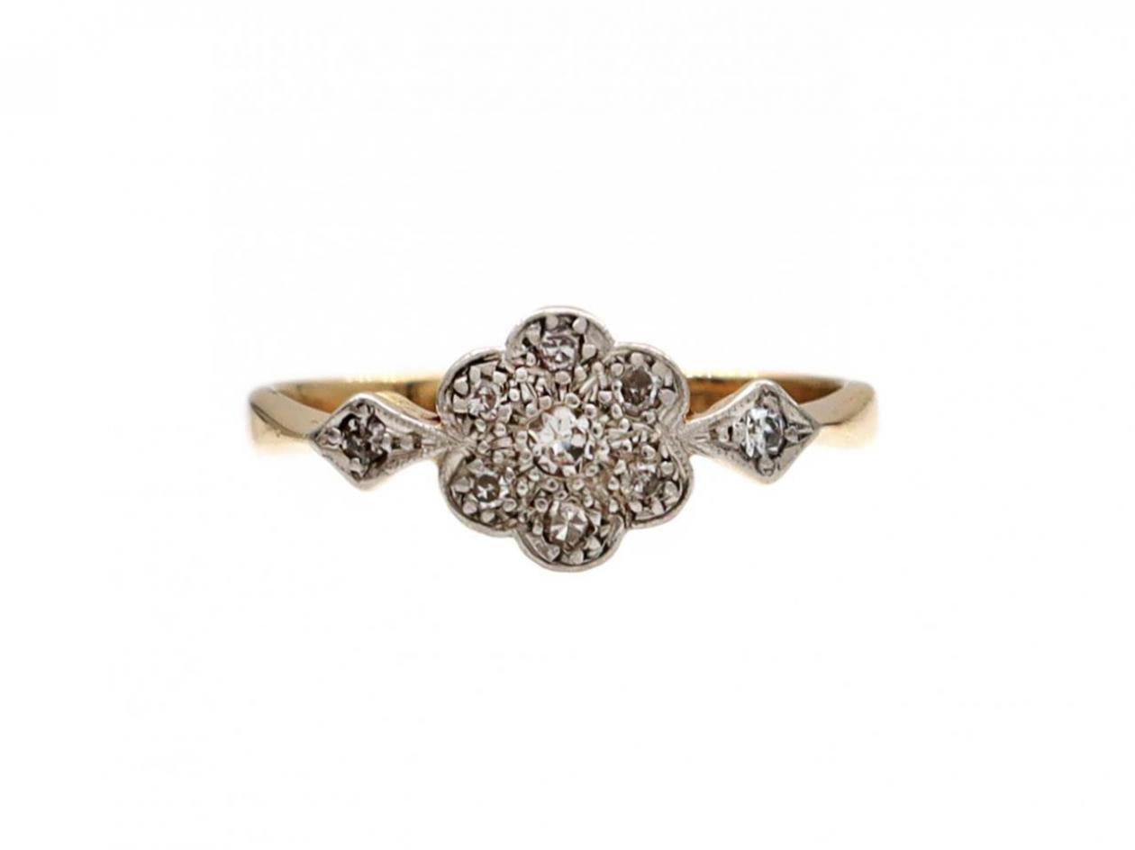 Antique diamond daisy cluster ring in 18kt gold