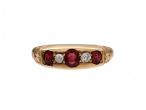 1899 five stone ruby and diamond ring in gold