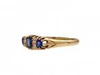 1910 sapphire and diamond three stone ring in 18kt yellow gold
