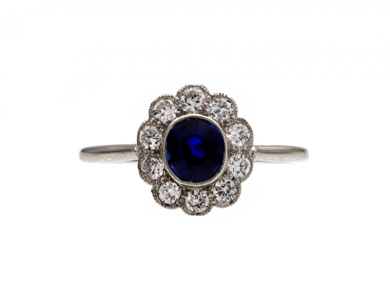 Edwardian sapphire and diamond floral cluster ring in platinum