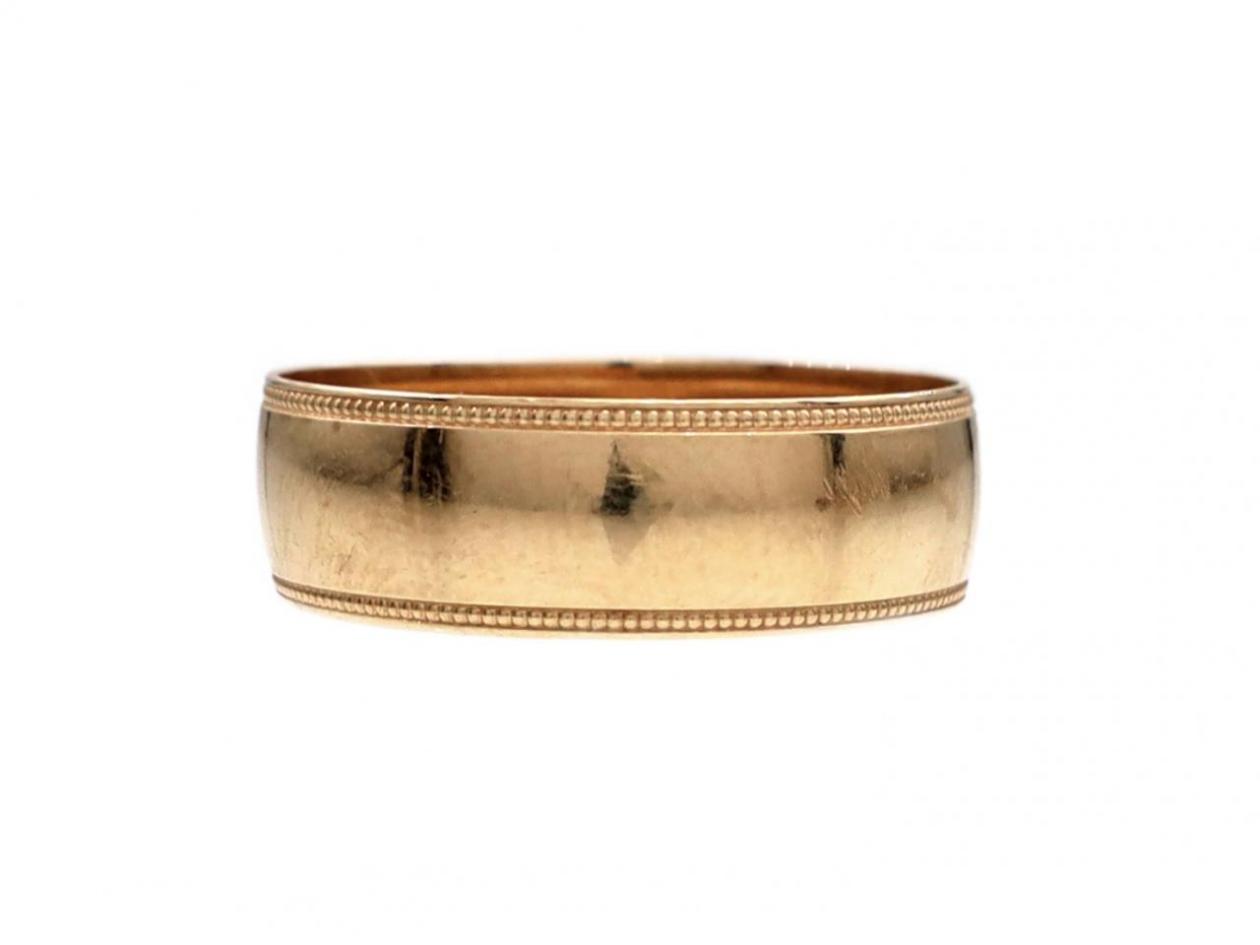 6mm millegrain border wedding ring in 9kt yellow gold