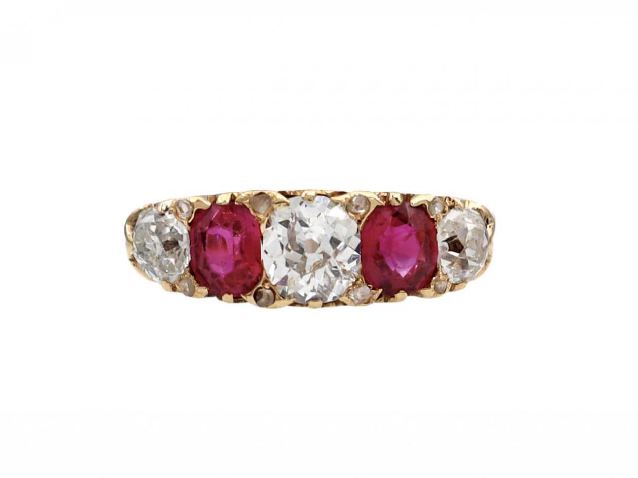 Victorian diamond and Burmese ruby five stone carved ring